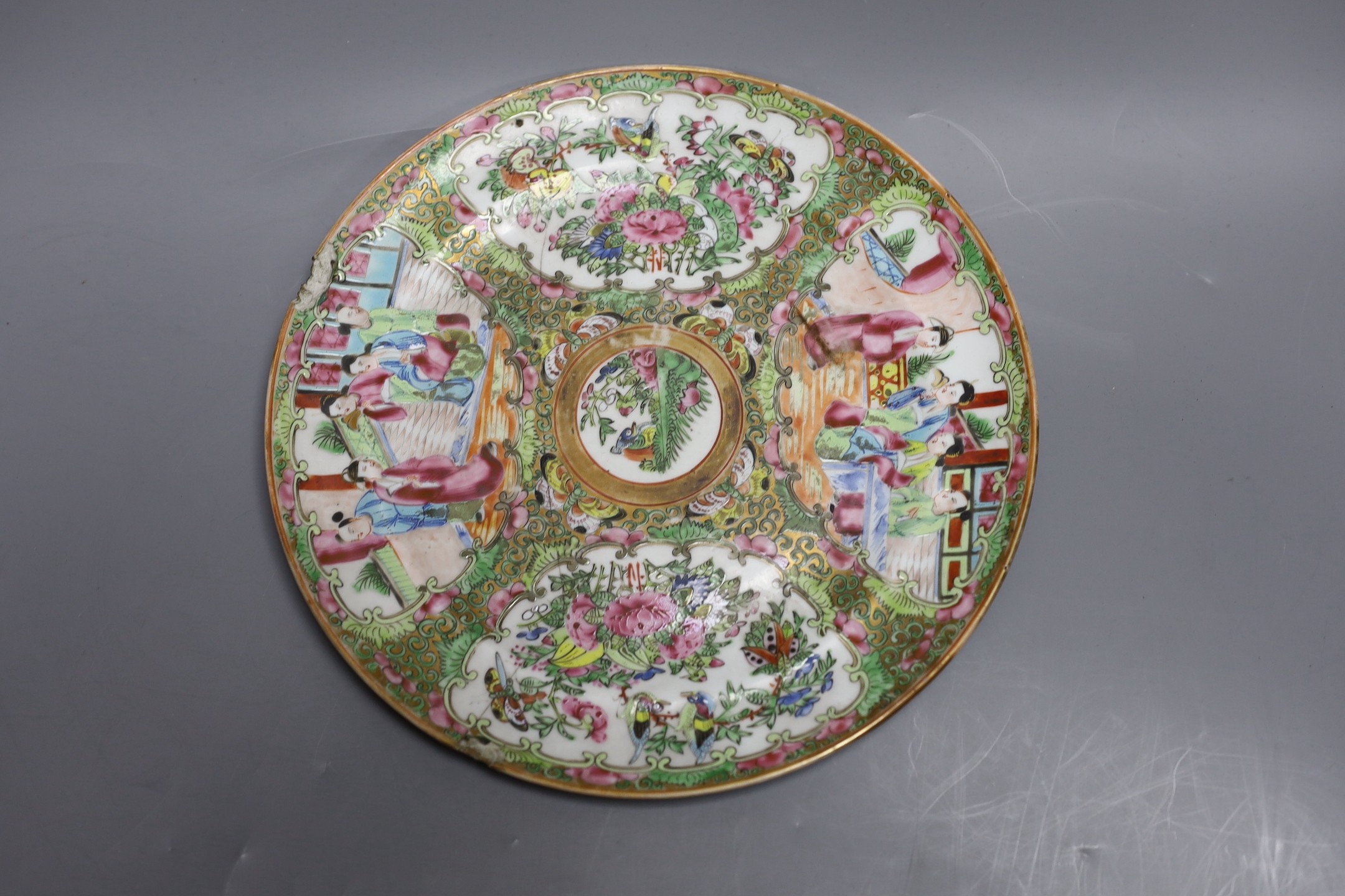 A Cantonese famille rose plate and teapot with cover, a pair of Chinese seated dogs, and a tureen with cover and oval dish, And a Chinese faux lacquer dragon and Phoenix dish, teapot 18 cms high
